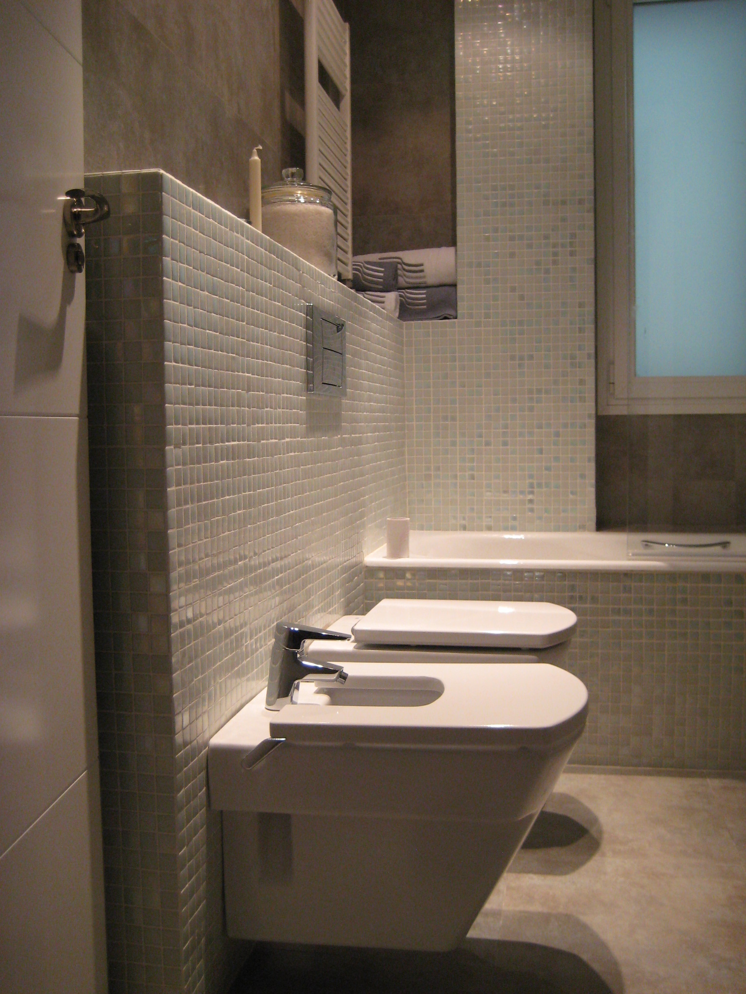 Reforma baño con ampliación de iluminación natural.